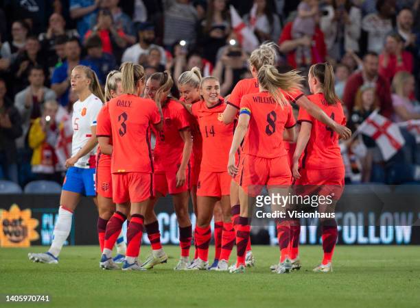 Ella Toone of England celebrates scoring her team's fourth goal with team mates Lauren Hemp, Rachel Daly, Alessia Russo, Millie Bright, Leah...