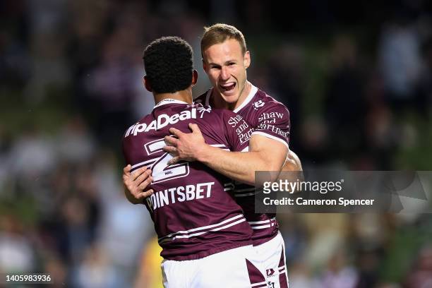 Jason Saab of the Sea Eagles celebrates scoring a try with Daly Cherry-Evans of the Sea Eagles during the round 16 NRL match between the Manly Sea...