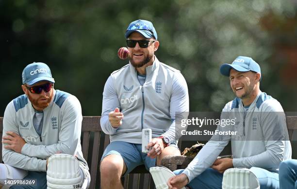 England coach Brendon McCullum shares a joke with batsmen Jonny Bairstow and Joe Root during nets ahead of the test match between England and India...