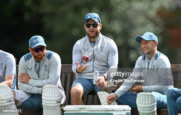 England coach Brendon McCullum shares a joke with batsmen Jonny Bairstow and Joe Root during nets ahead of the test match between England and India...