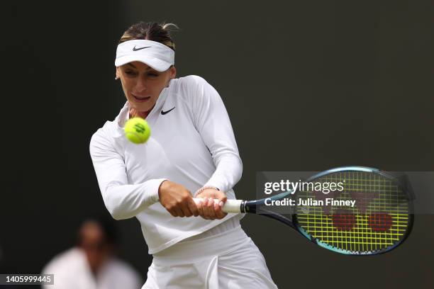 Ana Bogdan of Romania plays a backhand against Petra Kvitova of Czech Republic in their Women's Singles Second Round match on day four of The...