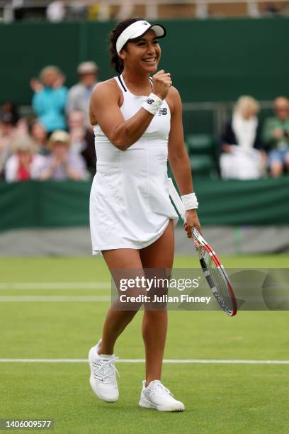 Heather Watson of Great Britain celebrates winning match point against Qiang Wang of China during their Women's Singles Second Round match on day...