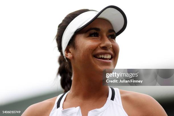 Heather Watson of Great Britain celebrates winning match point against Qiang Wang of China during their Women's Singles Second Round match on day...