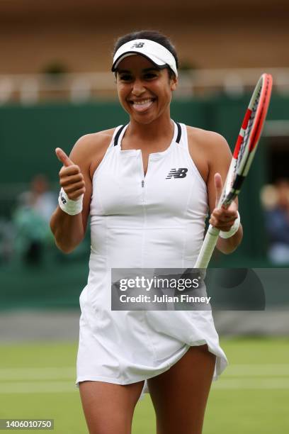 Heather Watson of Great Britain celebrates winning match point against Qiang Wang of China during their Women's Singles Second Round match on day...