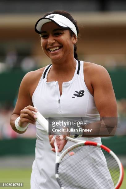 Heather Watson of Great Britain celebrates winning match point against Qiang Wang of China during their Women's Singles Second Round match on day...