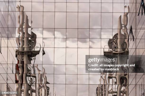 bridge piers reflected at salford quays. - salford stock pictures, royalty-free photos & images