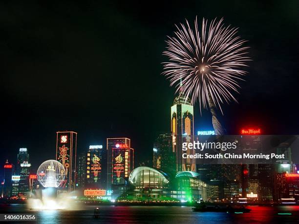 Firework display in Victoria Harbour during the handover of Hong Kong to mark the end of the British administration and China resuming sovereignty,...