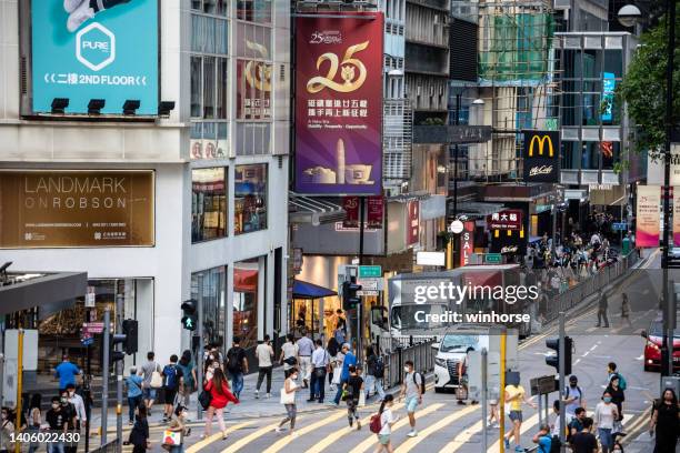 queen's road central in hong kong - hong kong advertising stock pictures, royalty-free photos & images