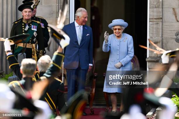 Prince Charles, Prince of Wales, known as the Duke of Rothesay while in Scotland, and Queen Elizabeth II attend the Royal Company of Archers Reddendo...