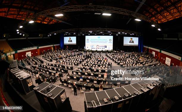 French President Emmanuel Macron speaks in the plenary session during the next to last day of the UN Ocean Conference on June 30 in Lisbon, Portugal....