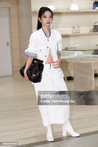 Soyeon of girl group I-DLE attends the photocall for 'Maison Margiela' reopening event at Lotte Department Store on June 30, 2022 in Seoul, South...