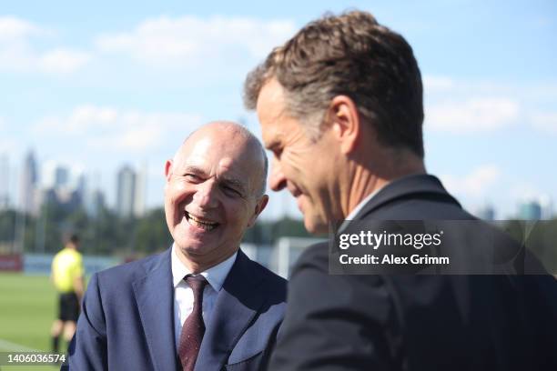 President Bernd Neuendorf and Oliver Bierhoff, DFB Director of National Teams and Academy chat during the opening of the DFB Campus on June 30, 2022...