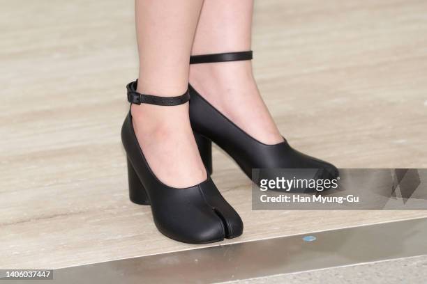 South Korean actress Lee Ju-Myung, shoe detail, attends the photocall for 'Maison Margiela' reopening event at Lotte Department Store on June 30,...
