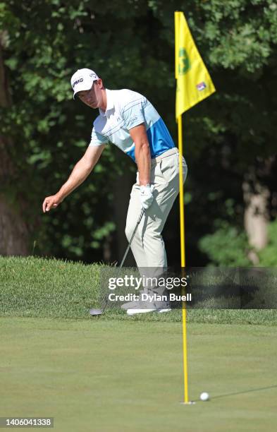 Maverick McNealy of the United States reacts to his shot on the 12th green during the first round of the John Deere Classic at TPC Deere Run on June...