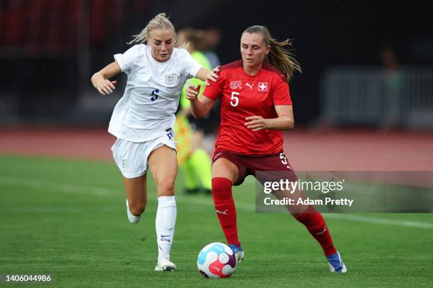 Alex Greenwood of England challenges Noelle Maritz of Switzerland during the Women's International friendly match between Switzerland and England at...