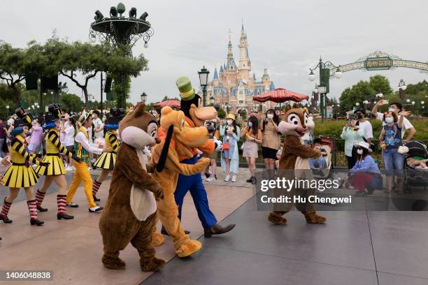 Cast members of Shanghai Disneyland parade on June 30, 2022 in Shanghai, China.