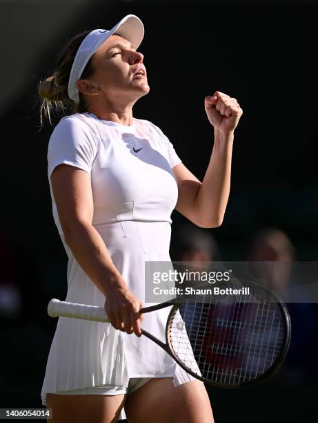 Simona Halep of Romania celebrates victory against Kirsten Flipkens of Belgium during their Women's Singles Second Round match on day four of The...