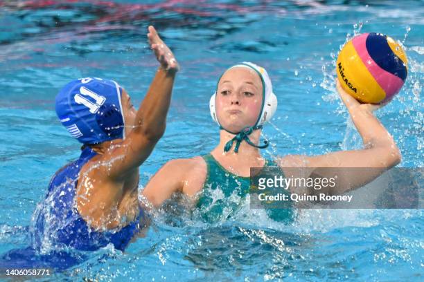 Abby Andrews of Team Australia controls the ball against Athina Dimitra Giannopoulou of Team Greece during the Women's Water Polo Classification 5-8...