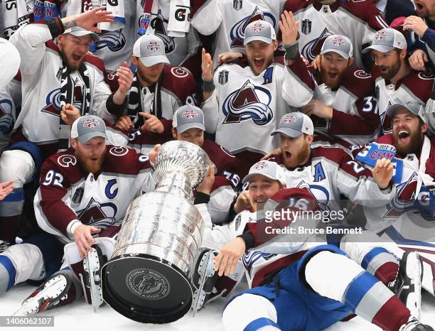 The Colorado Avalanche ding the Stanley Cup after their victory over the Tampa Bay Lightning in Game Six of the 2022 NHL Stanley Cup Final at Amalie...