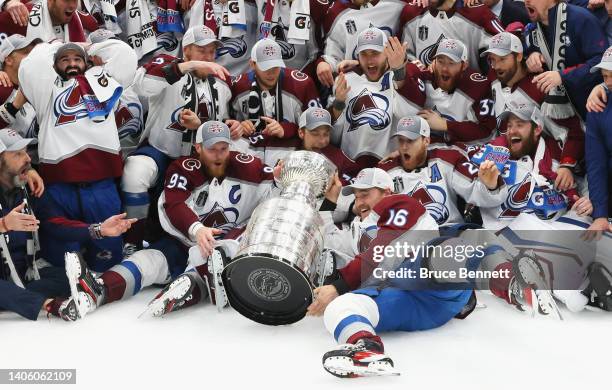 The Colorado Avalanche ding the Stanley Cup after their victory over the Tampa Bay Lightning in Game Six of the 2022 NHL Stanley Cup Final at Amalie...