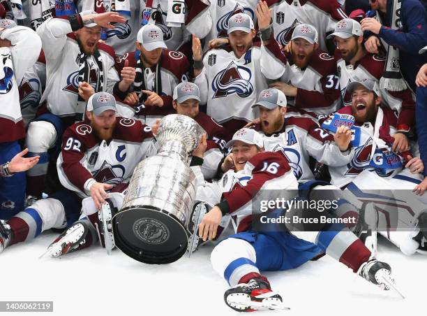 The Colorado Avalanche ding the Stanley Cup after their victory over the Tampa Bay Lightning in Game Six of the 2022 NHL Stanley Cup Final at Amalie...