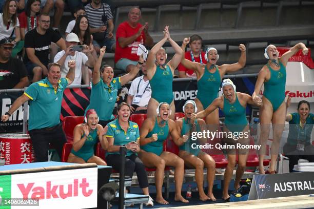 Head coach Paul Oberman and the rest of Team Australia celebrate after defeating Team Greece 16-14 in a penalty shootout during the Women's Water...