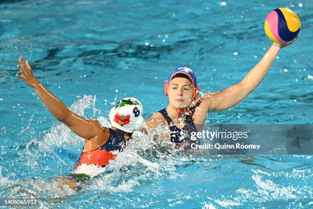 Simone Van De Kraats of Team Netherlands controls the ball against Rita Keszthelyi of Team Hungary during the Women's Water Polo Semifinal match on...