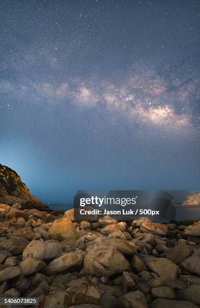 scenic view of sea against sky at night,hong kong - pacific ocean stock pictures, royalty-free photos & images