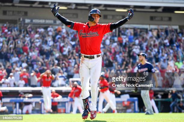 Andrés Giménez of the Cleveland Guardians celebrates hitting a walk off two-run home run off Tyler Thornburg of the Minnesota Twins to defeat the...