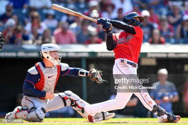 Andrés Giménez of the Cleveland Guardians hits a walk off two-run home run off Tyler Thornburg of the Minnesota Twins to defeat the Twins 5-3 at...