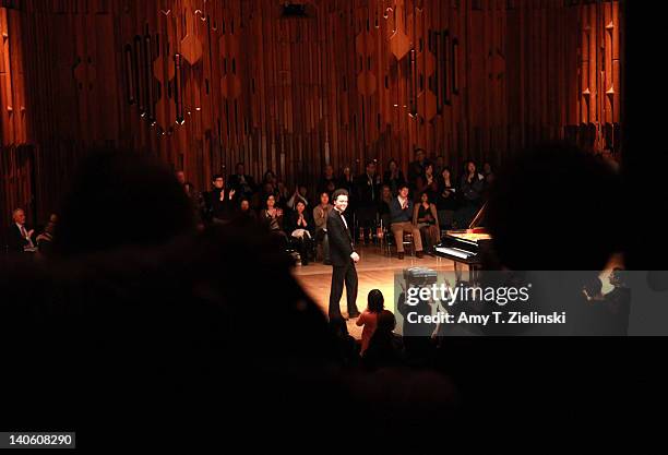 Russian pianist Evgeny Kissin acknowledges the audience as he performs a solo piano recital with works by composers Chopin and Samuel Barber in...