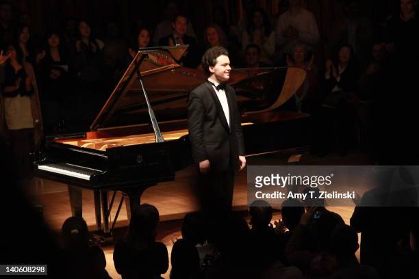 Russian pianist Evgeny Kissin performs a solo piano recital with works by composers Chopin and Samuel Barber in addition to Beethoven's 'Moonlight...