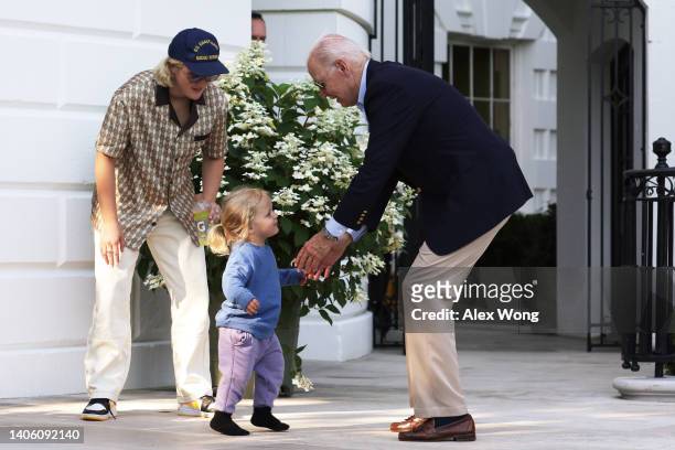 President Joe Biden is greeted by his grandson Beau Biden as granddaughter Maisy Biden looks on after he returned to the White House June 30, 2022 in...