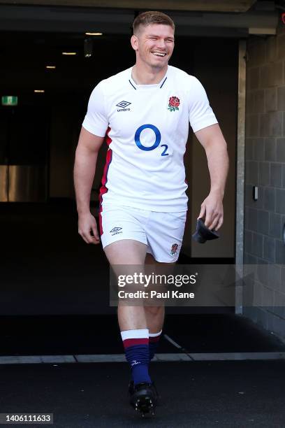 Owen Farrell laughs as he walks out to the field during the England Rugby squad captain's run at Optus Stadium on July 01, 2022 in Perth, Australia.