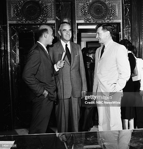 Pictured: NBC News' Joe Michaels, democractic presidential candidate New York Governor W. Averell Harriman, NBC News' Paul Cunningham in the lobby of...