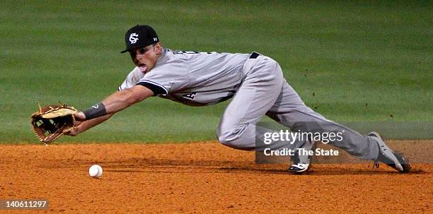 South Carolina shortstop Joey Pankake dives to snag a ground ball against Clemson at Joseph P. Riley Jr. Park in Charleston, South Carolina, on...