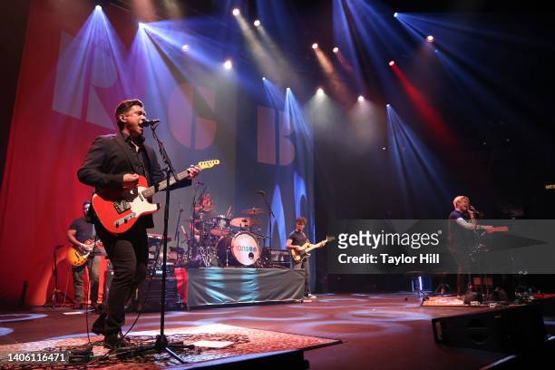 Isaac Hanson, Dimitrius Collins, Zac Hanson, Andrew Perusi, and Taylor Hanson of Hanson perform at The Roundhouse on June 30, 2022 in London, England.