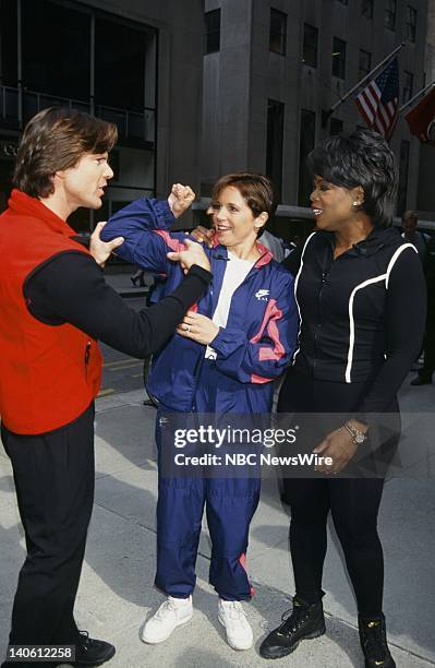 Personal trainer Bob Greene, NBC News' Katie Couric, TV host Oprah Winfrey on September 18, 1996 -- Photo by: Andrea Renault/NBC/NBC NewsWire