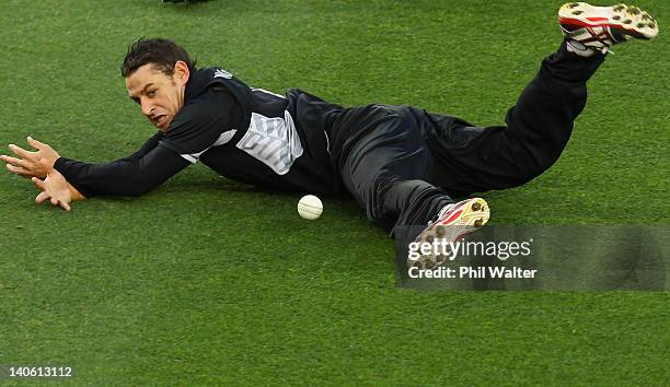 Nathan McCullum of New Zealand fumbles a catch during the One Day International match between New Zealand and South Africa at Eden Park on March 3,...