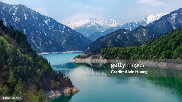 kurobe dam ( kuroyon dam) ,tateyama kurobe alpine route ,japan - aichi prefecture stock pictures, royalty-free photos & images