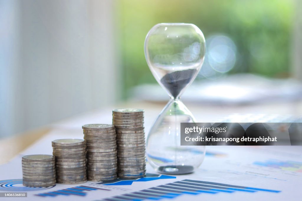 Coin step with hourglass