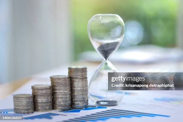 coin step with hourglass - time is money stock pictures, royalty-free photos & images