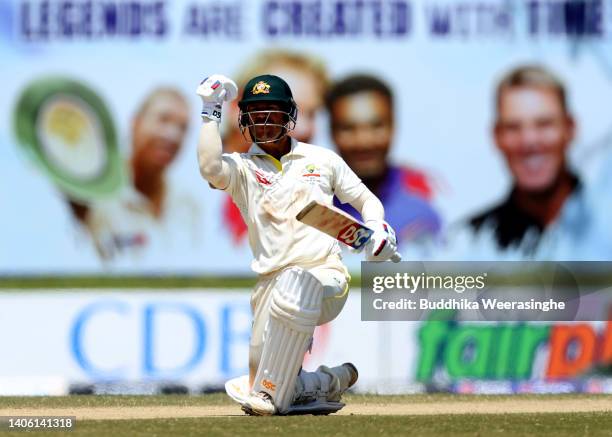 David Warner of Australia celebrates a victory during day three of the First Test in the series between Sri Lanka and Australia at Galle...