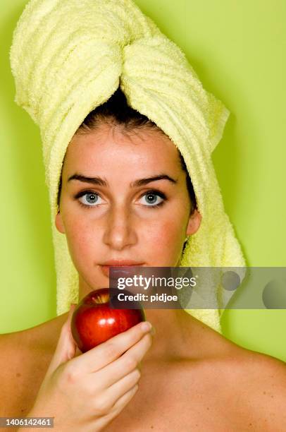 one young woman with red apple - israeli ethnicity bildbanksfoton och bilder