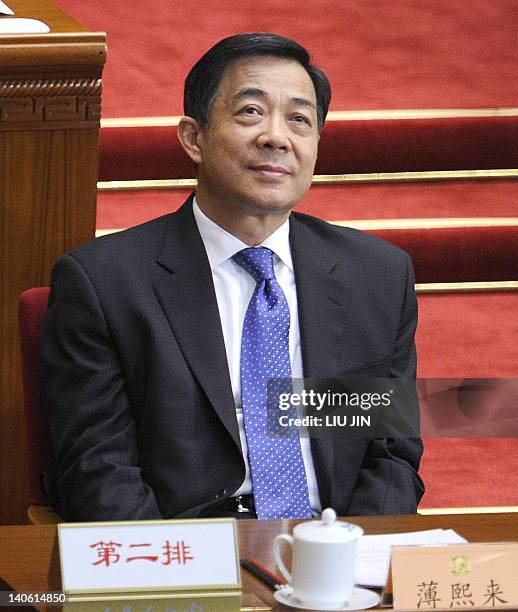 Chongqing Mayor Bo Xilai attends the opening session of the 11th National Committee of the Chinese People's Political Consultative Conference at the...