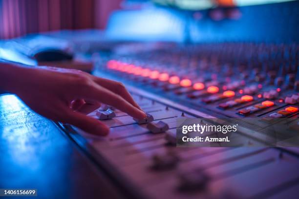 man operating with sound recording studio mixer - electric whisk stock pictures, royalty-free photos & images