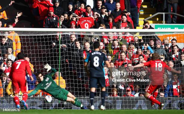 Wojciech Szczesny of Arsenal saves the penalty kick by Dirk Kuyt of Liverpool during the Barclays Premier League match between Liverpool and Arsenal...