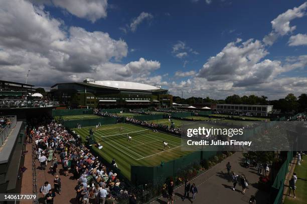 General view across the outside courts on day five of The Championships Wimbledon 2022 at All England Lawn Tennis and Croquet Club on July 01, 2022...