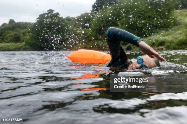 river swimming - girl power expressão inglesa imagens e fotografias de stock