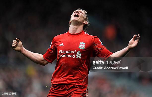Dirk Kuyt of Liverpool shows his dejection at the end of the Barclays Premier League match between Liverpool and Arsenal at Anfield on March 3, 2012...